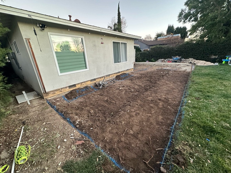 Paver base preparation during backyard remodel in Van Nuys CA