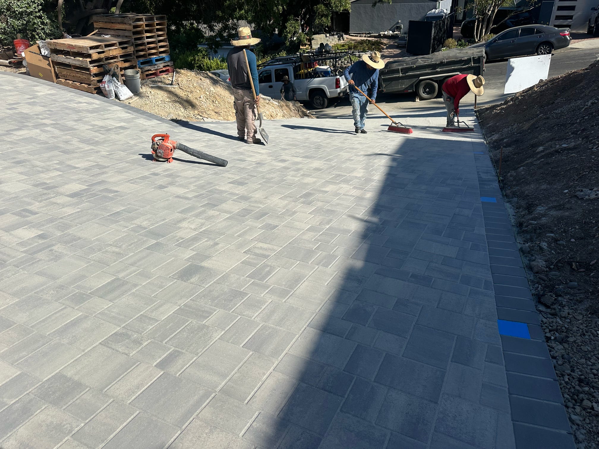Hillside Driveway Remodel in Woodland Hills, CA – Pavers, Retaining Wall & LED Lights