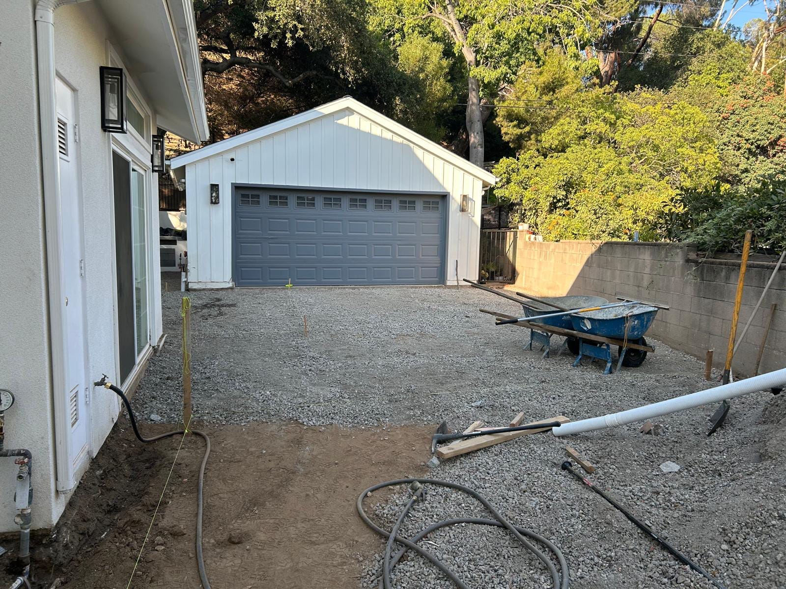Compacting soil before paver installation