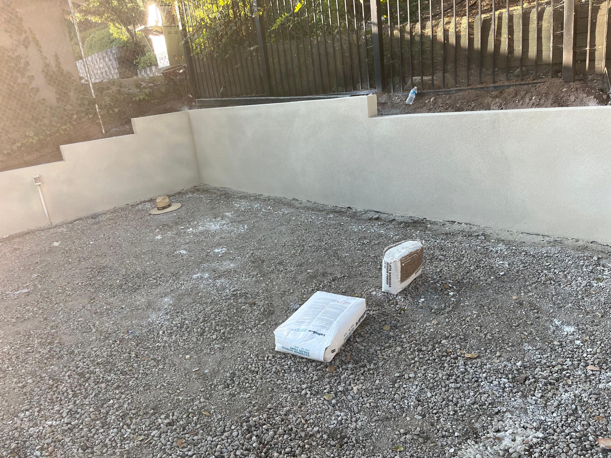 Excavating soil for new paver base installation