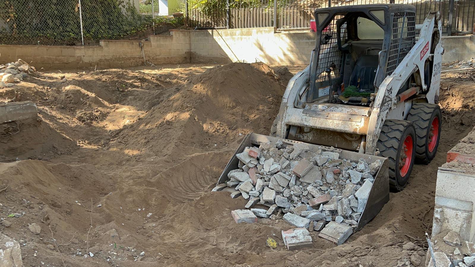 Preparing the ground for paver installation in LA