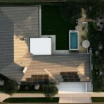 1. Modern backyard remodeling project in Los Angeles featuring large-format pavers, artificial turf, custom lighting, and luxury outdoor living design by Green Advisor Inc.