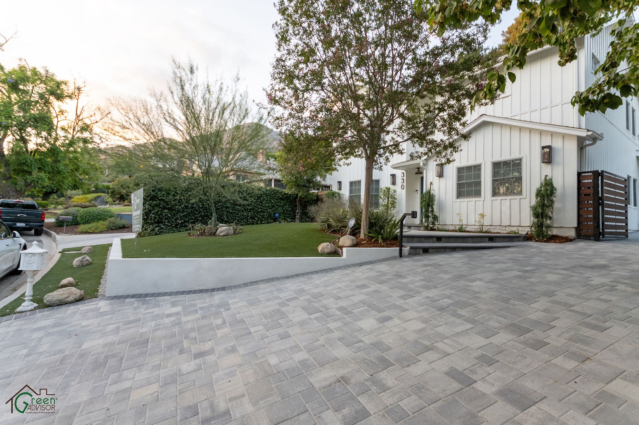 Hillside Driveway Remodel in Woodland Hills, CA – Pavers, Retaining Wall & LED Lighting