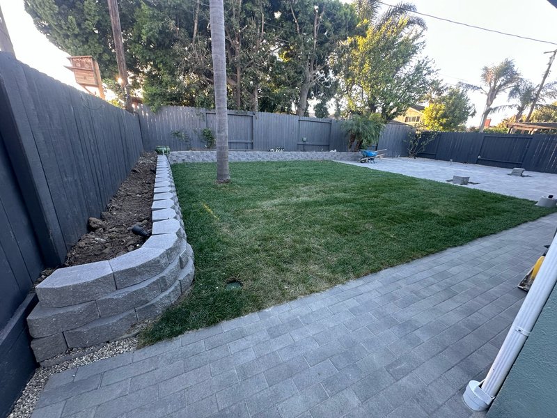 Curved porch paver detail and custom planter wall area in Torrance CA remodel