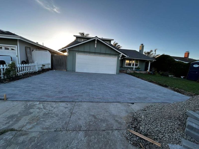Front yard remodel in Torrance CA with paver driveway expanded porch and new lawn